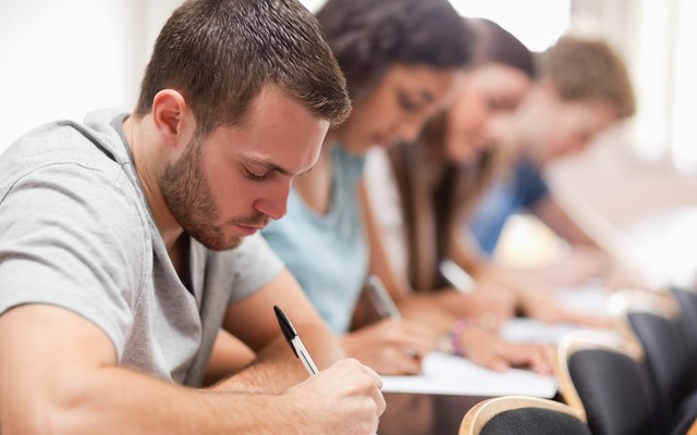 students in classroom taking a test