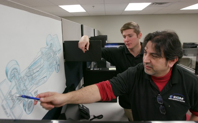 metrology instructor teaching through a CAD model of a race car