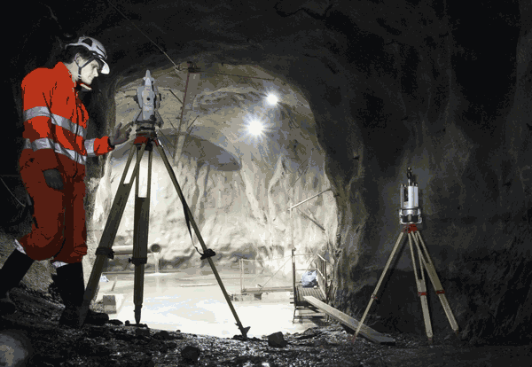 metrologist in a cave calibrating a laser tracker